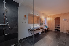 Shower, hair dryer, towels, soap