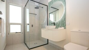 Shower, hair dryer, towels