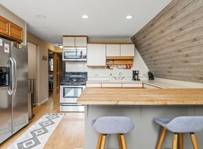 Fridge, microwave, oven, stovetop - Loch Nez, a spacious 3-bedroom home in Silver Lake, MI (Mears)