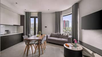 Two-Bedroom Apartment Balcony Ocean View | Living area | 44-inch Smart TV with cable channels