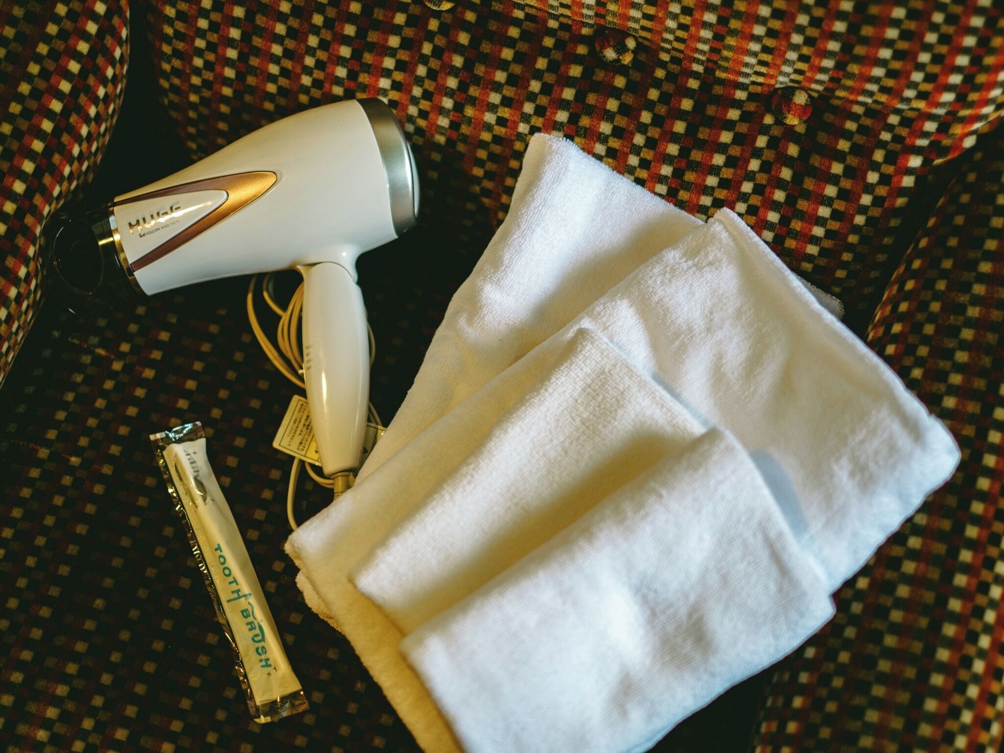 Secador de pelo y toallas