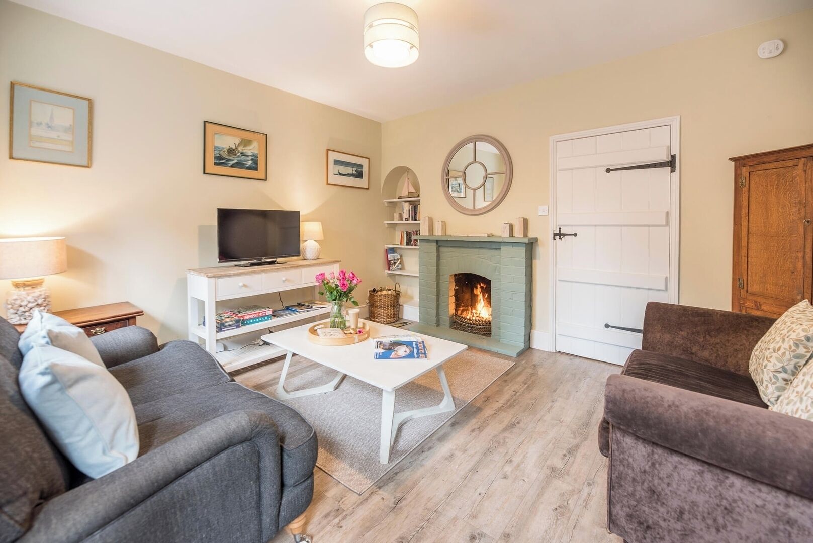 TV, fireplace, books