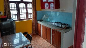 Comfort Apartment, Balcony, Garden View | Private kitchen | Full-size fridge, microwave, cookware/dishes/utensils - Villa AlexMarie guest house  (Candolim)