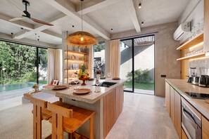 Villa | Private kitchen | Full-size fridge, microwave, oven, electric kettle - Garden Villa Ubud By BREIG (Ubud)