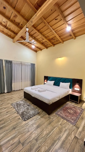 Desk, laptop workspace, soundproofing, iron/ironing board - Sunrise Sanctuary By Atya Hotels (Dhari)