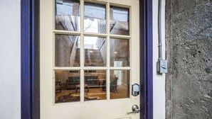 A beige door with a blue frame and six glass panes. - Beautiful Backyard | Blocks from Old Town (Lafayette)