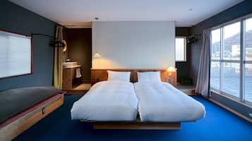 Camera con 2 letti singoli, patio, vista fiume | Wi-Fi gratuito