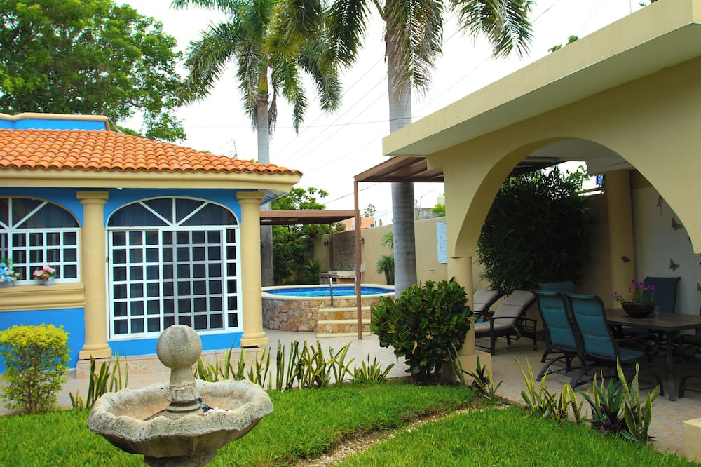Room in Apartment - Cozy Mérida Retreat With Pool & Garden View