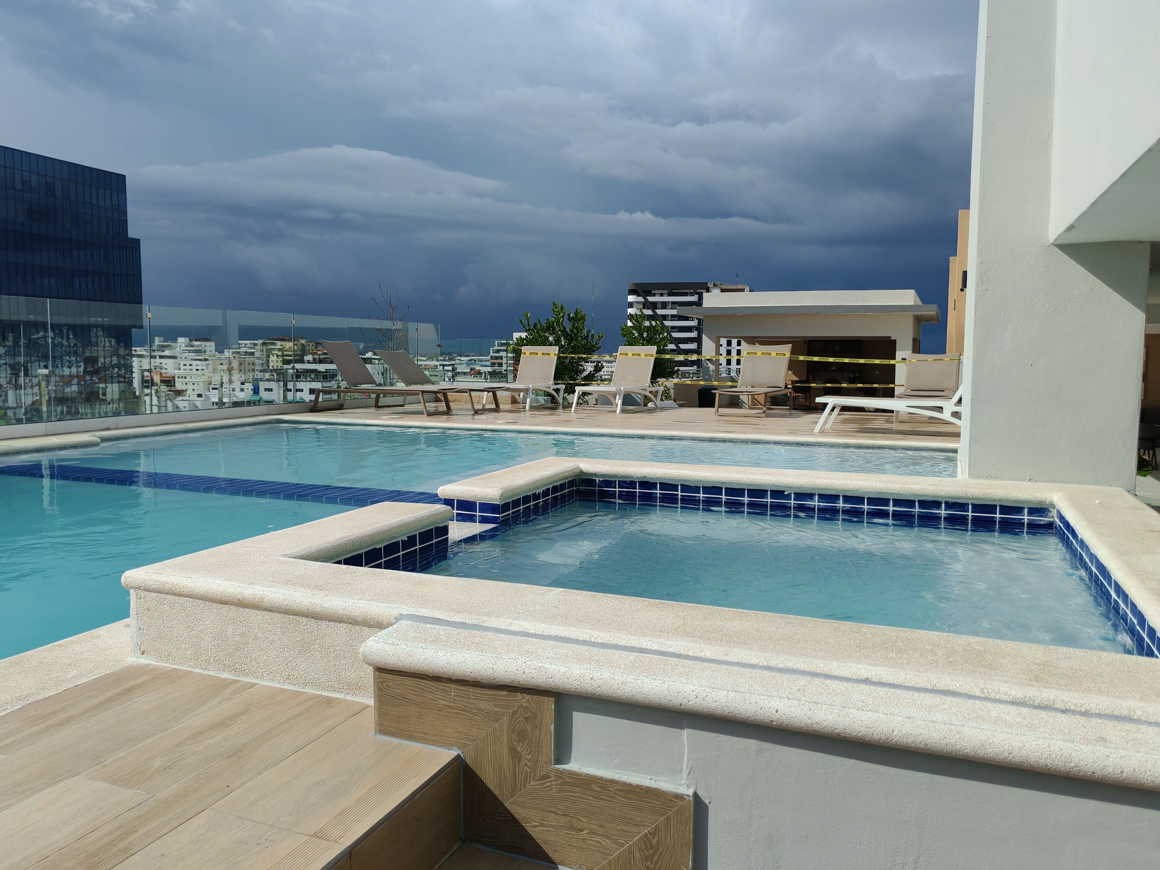 Outdoor pool, pool umbrellas, sun loungers