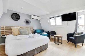 Fer et planche à repasser, Wi-Fi gratuit, draps fournis