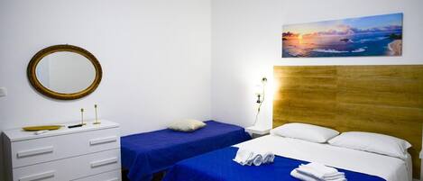 2 dormitorios, tabla de planchar con plancha, wifi gratis y ropa de cama