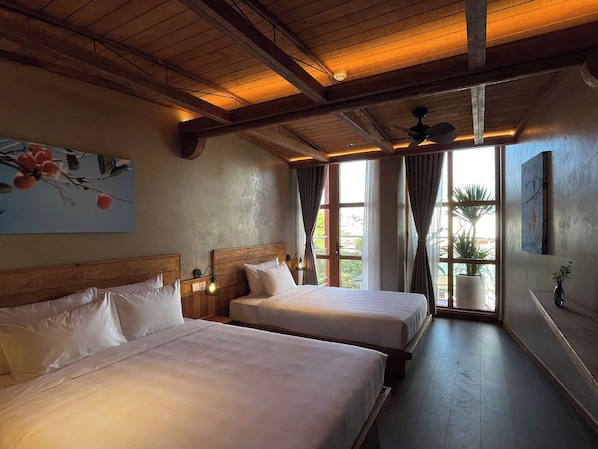 Deluxe Triple Room, Balcony, City View | Hypo-allergenic bedding, minibar, in-room safe, individually furnished - The Pink Boutique Hotel (Da Lat)