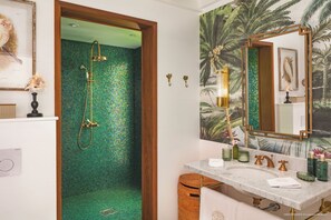 Shower, hair dryer, towels, soap