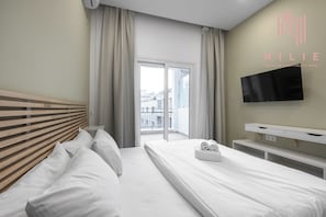Premium Studio, Balcony, City View | Individually decorated, individually furnished, laptop workspace