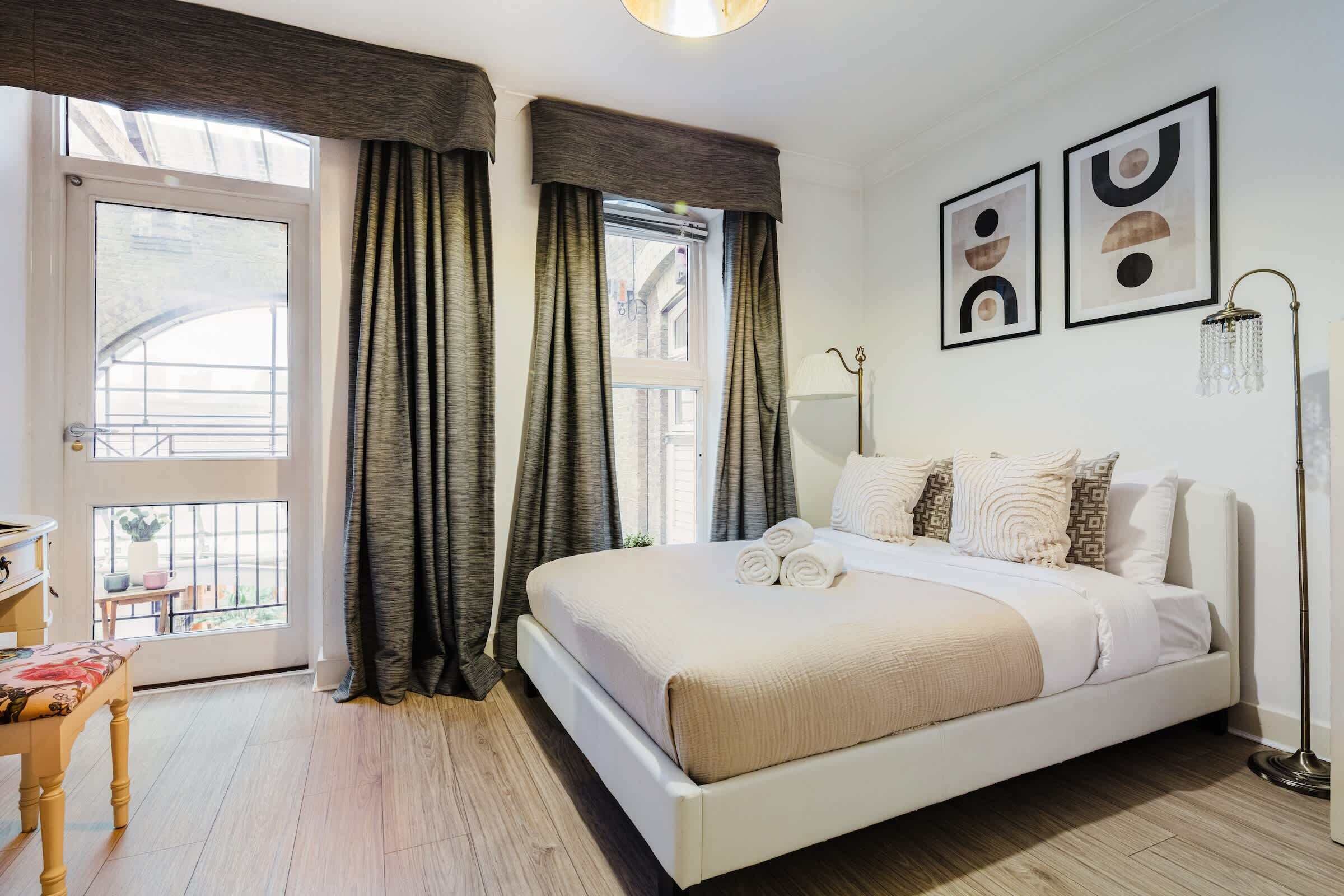 1 bedroom, desk, iron/ironing board, travel crib