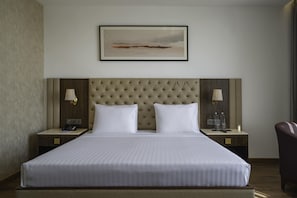Habitación Deluxe con 1 cama matrimonial o 2 individuales | Escritorio y wifi gratis 