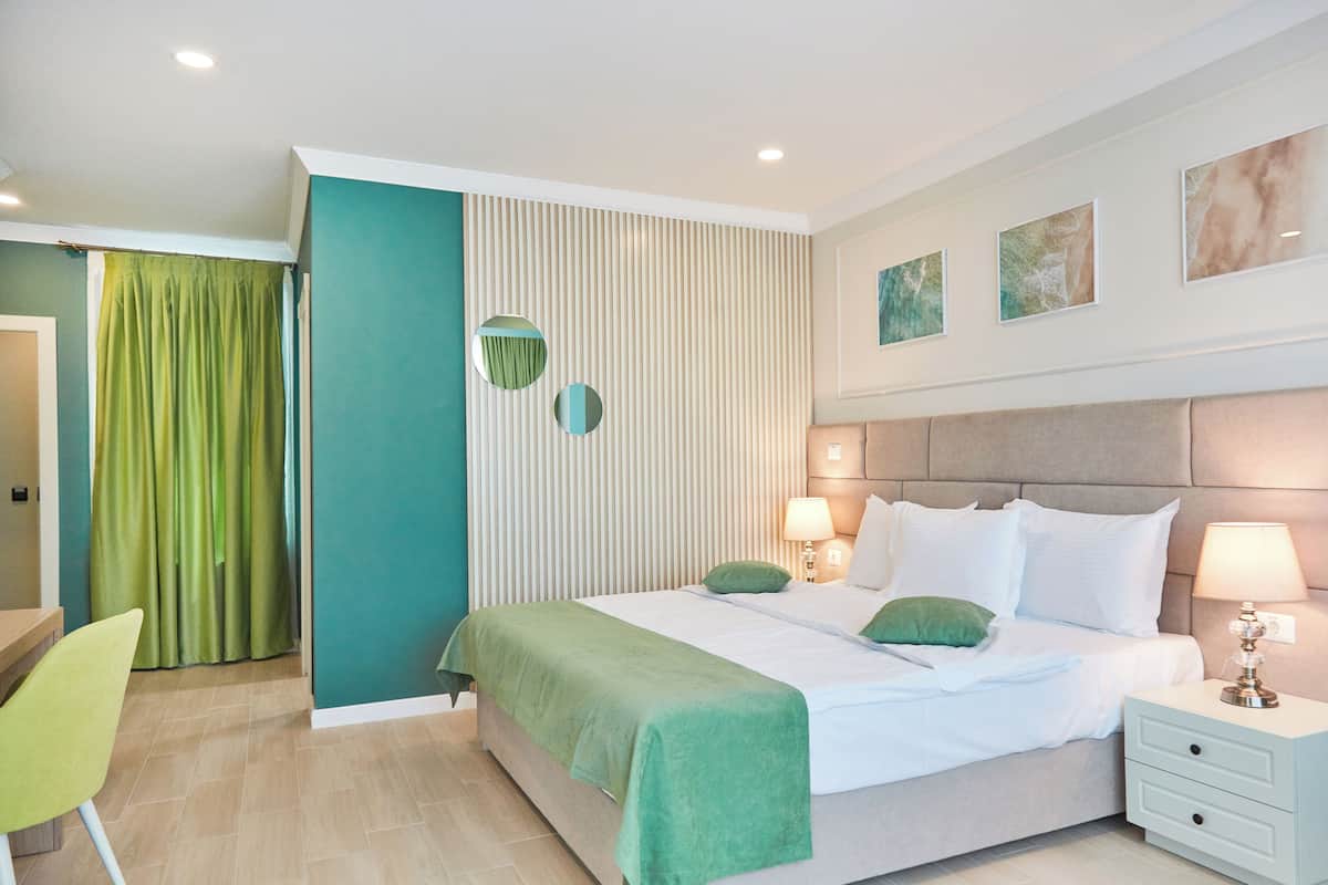 Superior Triple Room, Balcony, Partial Sea View | Desk, free WiFi