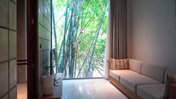 Grand Villa, 1 Bedroom, Non Smoking, Garden View | Living area | Flat-screen TV