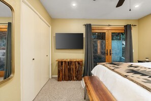 Bedroom #4- Second master bedroom located upstairs with a king size bed and an attached bathroom