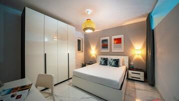 1 bedroom, desk, iron/ironing board, travel cot