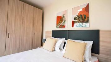1 bedroom, desk, iron/ironing board, travel cot