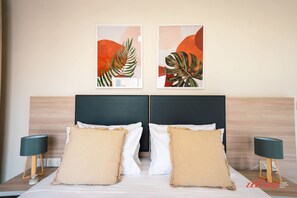 1 bedroom, desk, iron/ironing board, travel crib