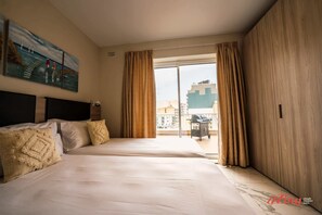 2 bedrooms, desk, iron/ironing board, travel crib