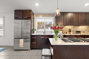 Fridge, microwave, oven, stovetop - "The Modern Muse" at Lake Harriet- by Roxy Rentals (Minneapolis)