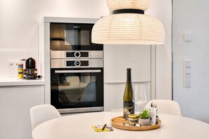 Coffee/tea maker, fridge, microwave, oven
