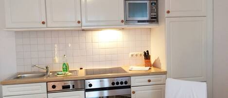 Fridge, microwave, dishwasher, coffee/tea maker