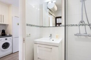 Hair dryer, towels, soap, shampoo