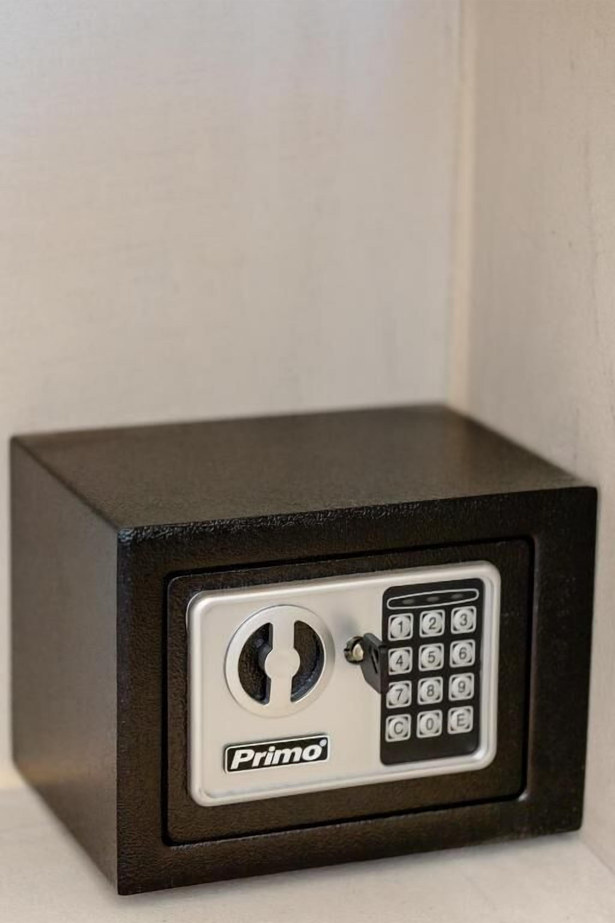 A black safe with a keypad and a keyhole, labeled "Primo."