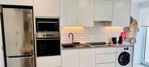 Fridge, microwave, oven, toaster - City House 1 by PontaNegraAzores (Angra do Heroísmo)