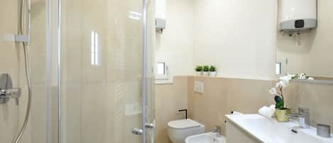 Shower, eco-friendly toiletries, hair dryer, bidet