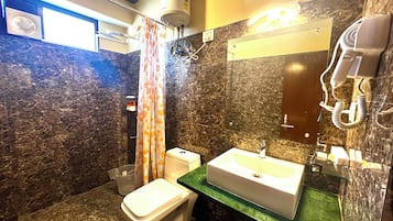 Shower, towels, soap, shampoo