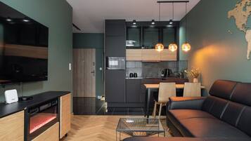 Departamento, balcón | Área de sala de estar | Televisión de pantalla plana de 37 pulgadas con canales vía satélite