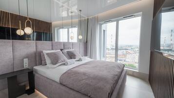 Departamento urbano, balcón | 1 habitación, tabla de planchar con plancha, wifi gratis y ropa de cama