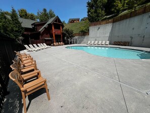 A heated pool - Spacious 5-Bedroom Smoky Mountain Cabin w/ Hot Tub, Game Room & Amazing Views (Sevierville)
