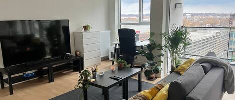 Apartment, River View | Living area | TV