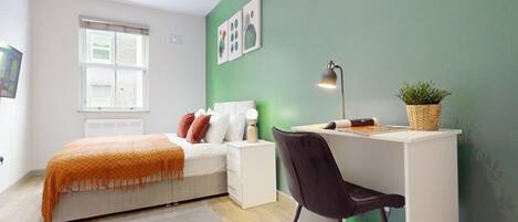 1 غرفة نوم ومكتب ومكواة/لوح كي وواي فاي