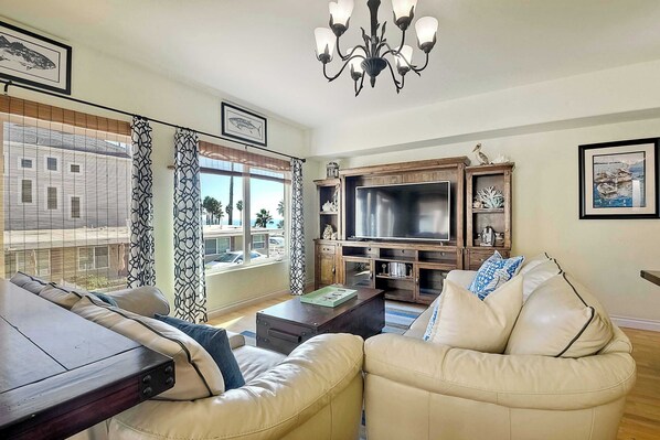 Condo, Multiple Beds, Patio, Ocean View (South Pacific) | Living area | 50-inch flat-screen TV with digital channels