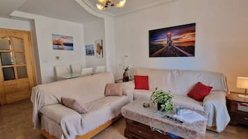 Apartamento conforto | Área de estar | TV