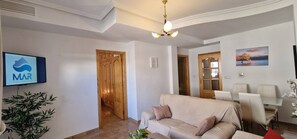 Departamento Confort | Área de sala de estar | Televisión 