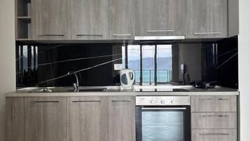 Apartamento, vistas al mar | Cocina privada