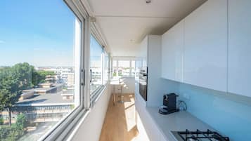 Panoramic Apartment | Private kitchen | Full-size fridge, oven, stovetop, dishwasher