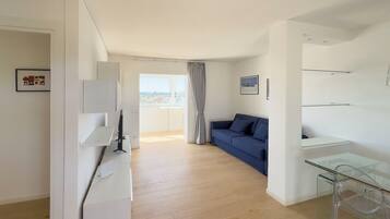 Panoramic Apartment | Living area | 40-inch Smart TV with digital channels