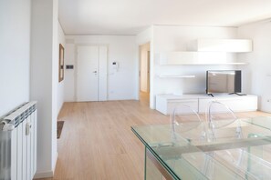 Panoramic Apartment | Living area | 40-inch Smart TV with digital channels - Caffarella Park Terraced 2Br Apartment (Rome)