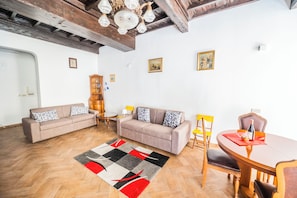 Apartment | Living area | 40-inch Smart TV with digital channels - Campo De Fiori Large Family Apartment (Rome)
