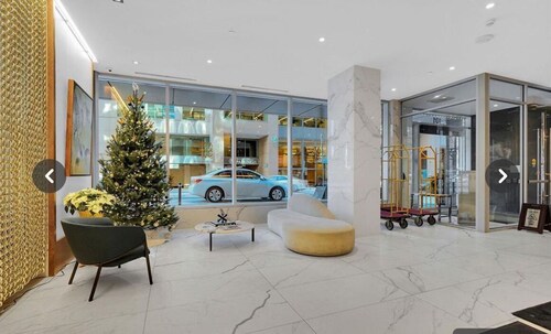 Walk to marketplace from secure condo backing onto Sparks St. (parking spot!) 