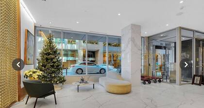 Walk to marketplace from secure condo backing onto Sparks St. (parking spot!)